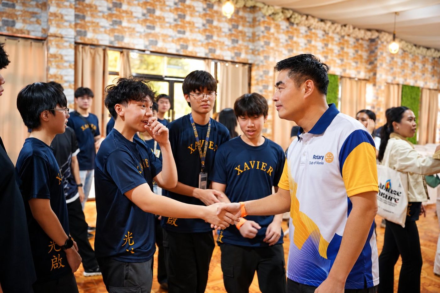 President Reggie Yu meets the Xavier School students who served as our Rotary Community Corps for the "29,000 Trees for 29 Years" project at Ipo Dam.