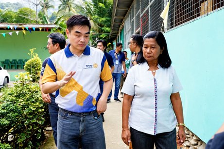 President Reginald Yu and the School Head walk the grounds and discuss the school’s most urgent needs.