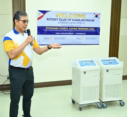 A speaker points out the donated neonatal care units during the turnover ceremony at UP–PGH, 4 September 2026.